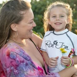 Ron Jon Kids White Hibiscus Rash Guard -OOfos Sale d800x800 11730063000 no color required ron jon kids white hibiscus rash guard lifestyle 1